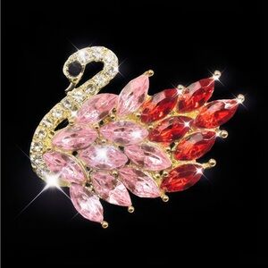 Elegant Swan Brooch with Red and Pink Crystals